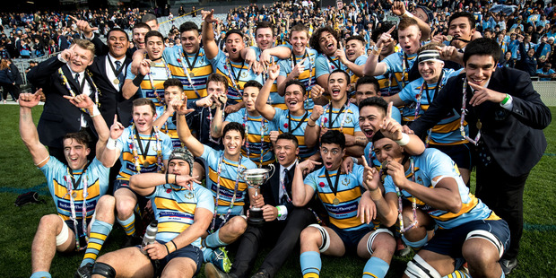Mt Albert Grammar players celebrate after the win during the Auckland 1st XV final. Photo / Dean Purcell