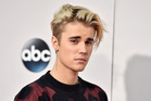 Justin Bieber has had enough with his fans saying hateful things about his new 'girlfriend'. Photo / AP