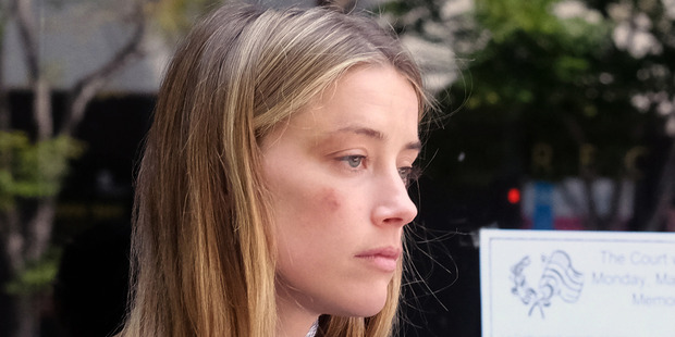 Actress Amber Heard sat through a seven-hour long deposition after claiming Johnny Depp was abusive toward her. Photo / AP