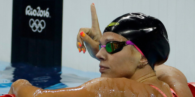 Russia's Yulia Efimova celebrates winning a semifinal of the women's 100m breaststroke. Photo / AP