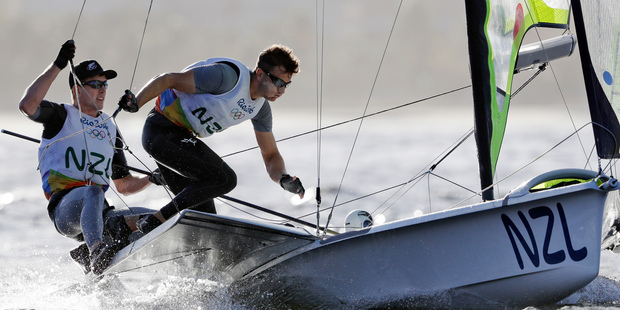 New Zealand's Peter Burling, right, and teammate Blair Tuke compete during the 49er men race at the 2016 Summer Olympics in Rio de Janeiro. Photo / AP.