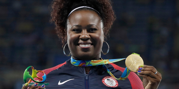 United States' Michelle Carter celebrates winning the gold medal in the women's shot put during the athletics competitions of the 2016 Summer Olympics. Photo / AP.
