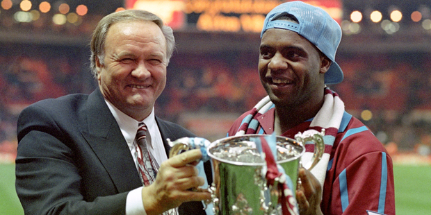 Aston Villa manager Ron Atkinson holding the English League Cup with former Aston Villa player Dalian Atkinson at Wembley Stadium in London in 1994. Photo / AP