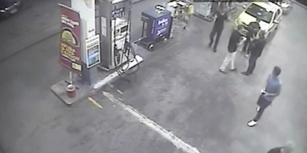 Frame from surveillance video released by Brazil Police, swimmers from the United States Olympic team appear with Ryan Lochte at the gas station. Photo / AP