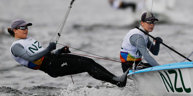New Zealand's Polly Powrie, left, and Jo Aleh compete during the 470 women race at the 2016 Summer Olympics in Rio. Photo / AP