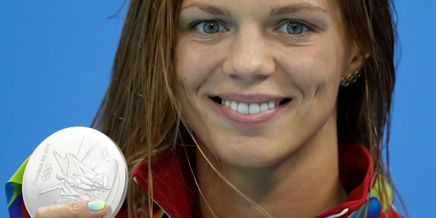 Efimova shows off her silver medal for the women's 200m breastroke final. Photo / AP