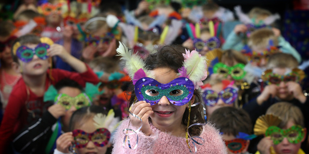 Mount Maunganui Primary students have made Brazilian masks for different countries for the Rio Olympics. Photo/John Borren