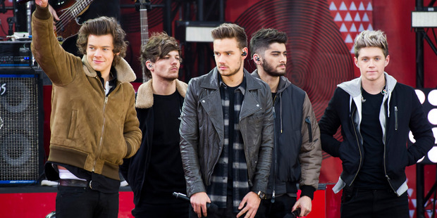 Zayn Malik with his band mates in One Direction. Photo / AP