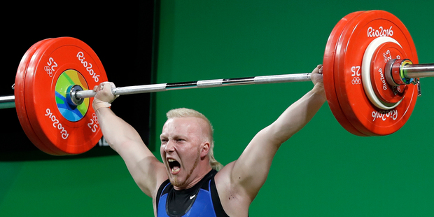 Milko Olavi Tokola, of Finland, competes during the men's 85kg weightlifting competition at the 2016 Summer Olympics in Rio de Janeiro. Photo / AP.