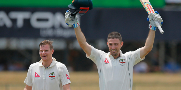 Shaun Marsh celebrates his century during what was the highest second-wicket stand for Australia in Tests against Sri Lanka with Steve Smith. Photo / AP