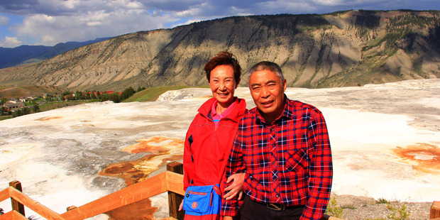 Chen Aiwu, 64, and her husband, Wang Dongsheng, 66, at Yellowstone National Park in June. Photo / Supplied