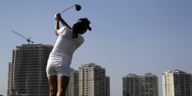 Lydia Ko tees off during a practice round ahead of the Rio Olympics golf event. Photo / AP