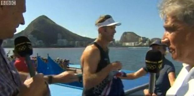 John Inverdale, right, stops Kiwi rower Mahe Drysdale after his historic gold medal win only for Sir Steve Redgrave to stop the interview. Photo / via BBC