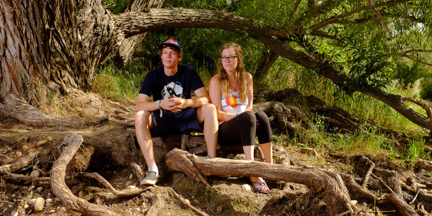 Claire Secrist, 23, photographed with her boyfriend, Jarrad Doolittle, 22, thinks Hillary Clinton belongs in jail. Photo / The Washington Post
