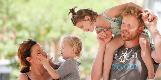 Jo and Wes Tongue with their daughters, Evie, 4, and Lu, 3. The Tongues are disillusioned with the presidential campaign and undecided about which candidate to support. Photo / The Washington Post