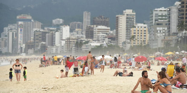 The Rio de Janeiro skyline rises behind Ipanema Beach. Photo / Washington Post