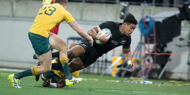 All Blacks wing Julian Savea scoring against the Wallabies. Photo / Mark Mitchell