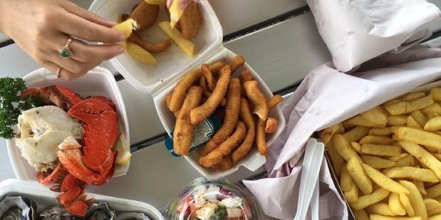You can't beat a seafood lunch by the coast. Photo / Jenny Hewett