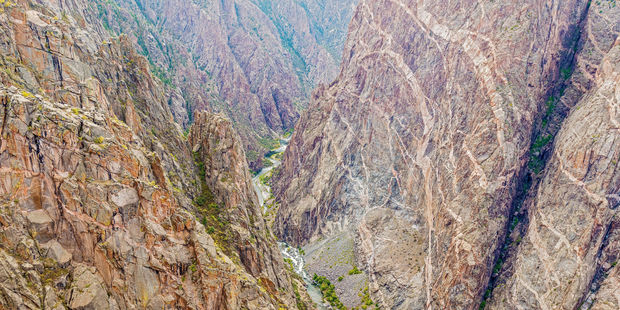 Sunlight only reaches the bottom of the Black Canyon at midday. Photo / 123RF
