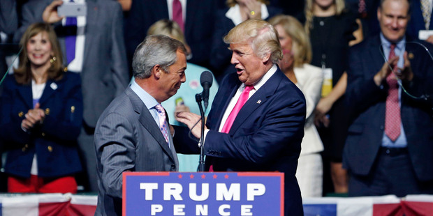 Republican presidential candidate Donald Trump welcomes Nigel Farage, ex-leader of Ukip, to speak at a campaign rally in Mississippi. Photo / AP