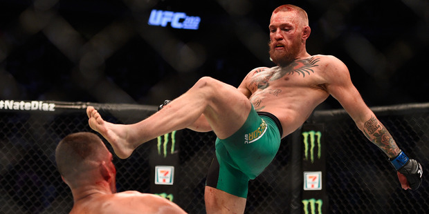 Conor McGregor fights Nate Diaz in their welterweight bout during the UFC 202. Photo / Getty