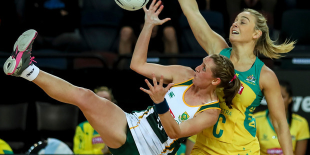 Erin Burger of South Africa takes a pass under pressure from Stephanie Wood of Australia. Photo / photosport.nz