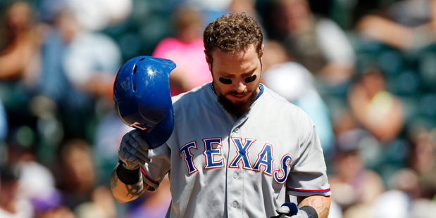 Texas Rangers' Josh Hamilton reacts after striking out against the Colorado Rockies. Photo / AP