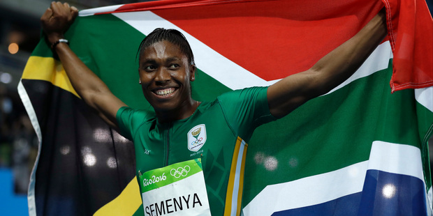 South Africa's Caster Semenya smiles after winning the gold medal in the women's 800-metre final. Photo / AP