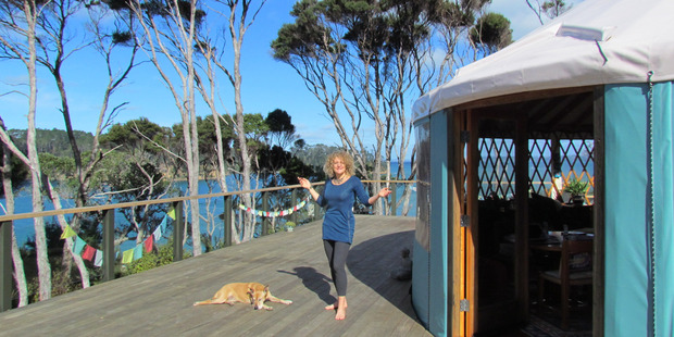 Georgia Duder-Wood and her dog honey at their Yurt home. Photo / Simon Wood