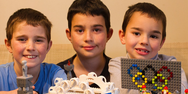 Jacob Orsler, Sam Orsler, and Isaac Orsler. The young brothers decided they would turn their favourite Olympic moments into lego creations. Photo / Alan Gibson