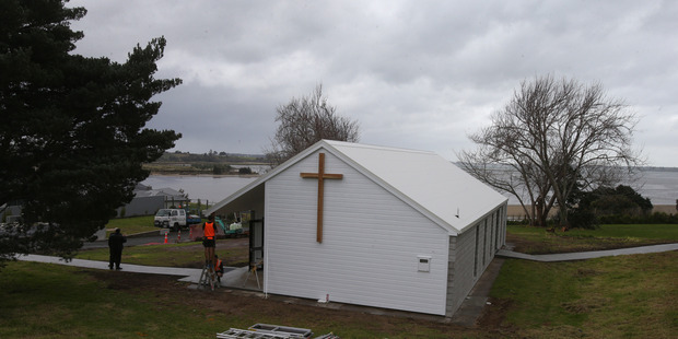 After: The finishing touches are being put to Bethlehem's new St Therese's Catholic Chapel overlooking Tauranga Harbour. PHOTO/JOHN BORREN