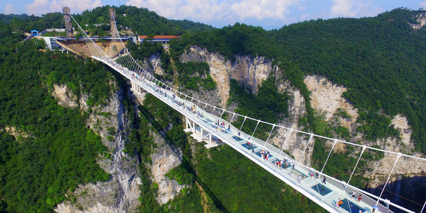 The bridge is 430 meters long and six meters wide, with a terrifying 300 metre drop. Photo / AP