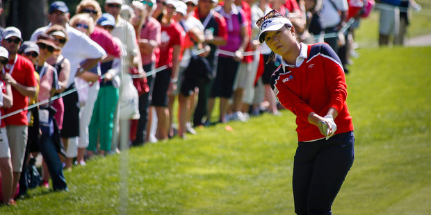 Lydia Ko chips onto the first green during the second round of the LPGA's Canadian Open. Photo / AP