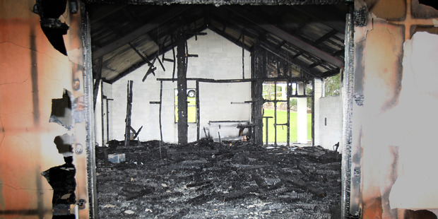 The guttered interior of Bethlehem's St Therese's Church after it was destroyed by fire in February 2014. PHOTO/FILE