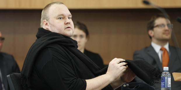 Kim Dotcom appearing in Auckland District Court for the decision on his extradition. Photo / Nick Reed