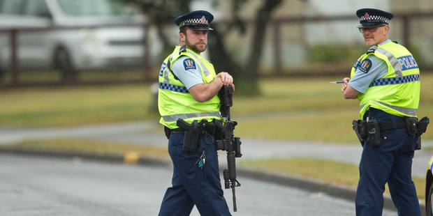 Police at checkpoints in Fordlands this week. PHOTO/STEPHEN PARKER