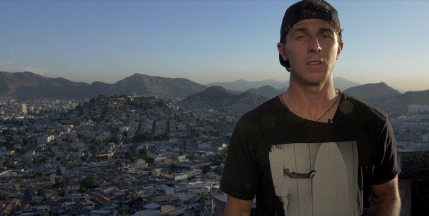 Kayaker Mike Dawson funded his way to Rio by selling a cookbook, then gave out food parcels to people living in poverty in the city's favelas. Photo / SUPPLIED