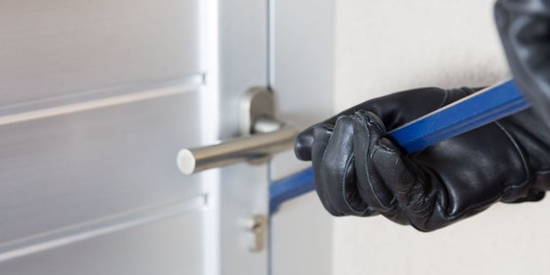 Suspected gang members raided burglar Luke Reich's home looking for stolen firearms, but police got there first. Photo / Getty Images