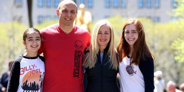 Jen with her husband Paul and daughters Emma and Isabelle in Central Park, New York. Photo / Nathan Edwards / News Corp Australia