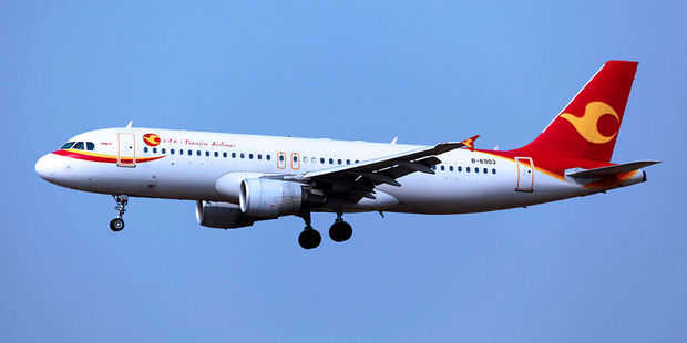 A Tianjin Airlines A320 aircraft. The airline will fly larger A330 jets between Tianjin, Chongquing and NZ three times a week from December. Photo / byeangel from Tsingtao. Creative Commons.
