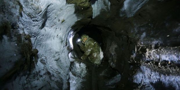 Some tuskers use the excavating power of the pressurized water to bore deep underground. This tunnel runs for over 60 metres. Photo / Amos Chapple/RFE/RL