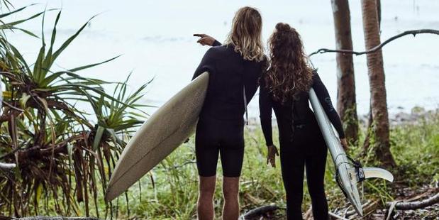Surfers at Noosa. Photo / Jenny Hewett