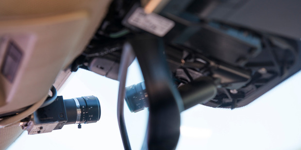 A view of a small camera mounted next to the rear view mirror of a self-driven car. Photo / Linda Davidson