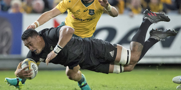 All Blacks loose forward Jerome Kaino goes over to score against Australia. Photo / Brett Phibbs