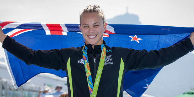 Lisa Carrington celebrates after winning gold in the women;s K1 200m event in Rio. Photosport