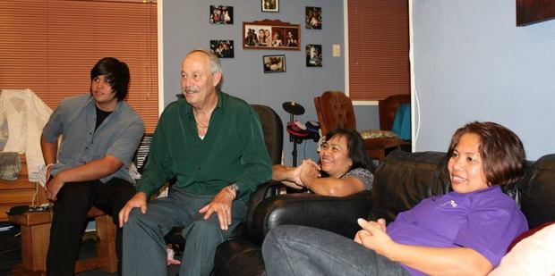 Meddy Muir (second from right) with her son James and husband, also called James and a family member. PHOTO/FACEBOOK