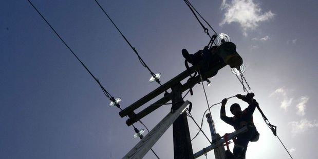 Power lines are down across Whakamarama Rd after a car crash. Photo/file