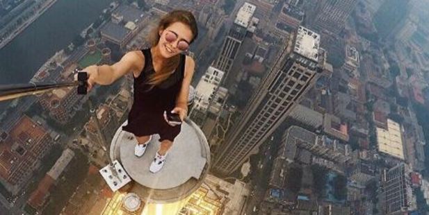 These astonishing photos of Russian 23-year-old Angelina Nikolau's sky-high catwalk show have turned her into a social media sensation. Photo / Angela Nikolau Instagram