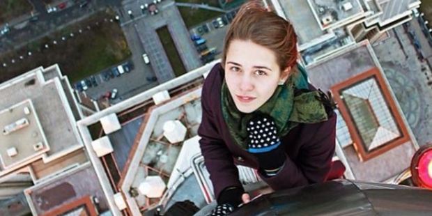 But it's not just selfies, she also has fellow skyscraper-wandering friends photograph her clambering up tall buildings. Photo / Angela Nikolau Instagram