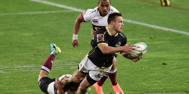 Wellington's Wes Goosen is tackled by North Harbour's Matt McGahan and Tevita Li. Photo / photosport.nz